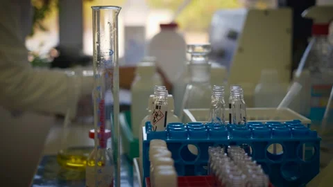 Hands working with test tubes Stock Footage 223526911