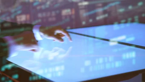 The hands working with a touchscreen display on the hologram background Stock Footage 100560076