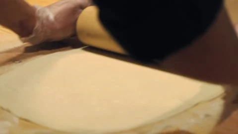 Hands wrinkle the dough. Stock Footage 131131038