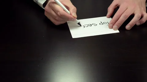 Hands write the message top secret Vídeos de archivo 47485640