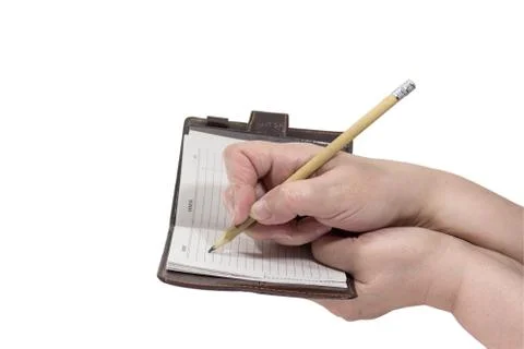 Hands write a pencil in your notebook Stock Photos