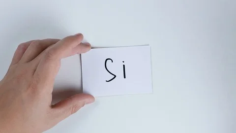 Hands writes SI on the Catalan flag and turns it over Stock Footage