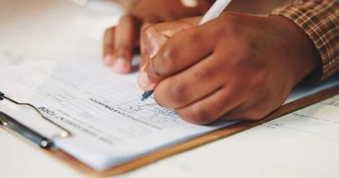 Hands, writing and application form for insurance with clipboard, risk 库存照片