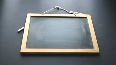 Hands writing on blackboard the word " creativity" Stock-Footage 56372310
