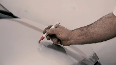 Hands writing on car windscreen Stock Footage 86238794