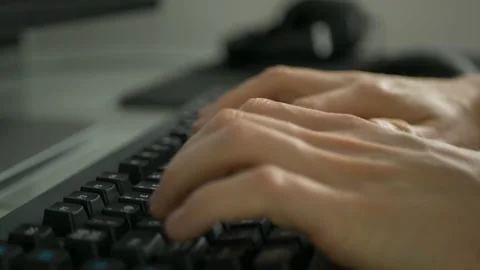 Hands Writing Code On A Computer Keyboard In A Bright Home Office Stock Footage 136657327