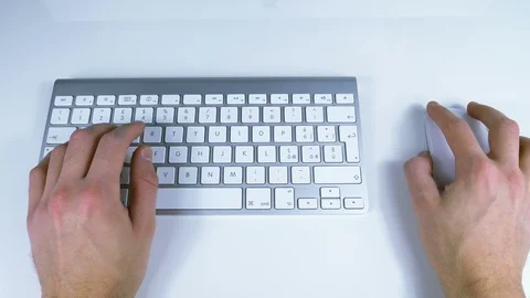 Hands writing on the keyboard and move the mouse Stock Footage 87261085