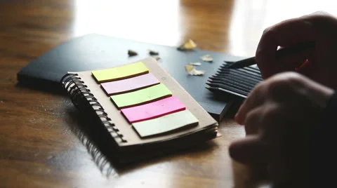 Hands writing with pencil taking notes on the table at home Stock-Footage 55843493