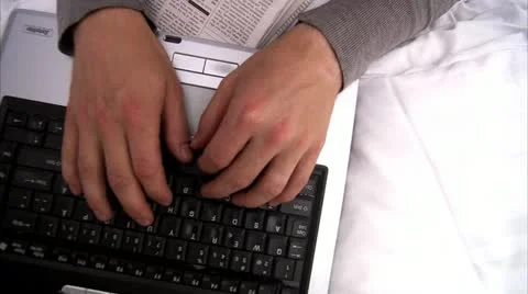 Hands writing on a portable computer Stock Footage 11320949