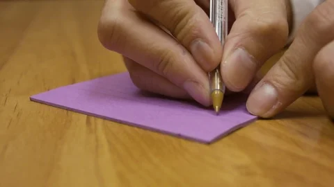 Hands Writing On Small Notepad Stock Footage 79237760