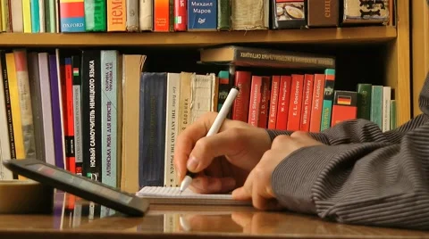 Hands writing, a view from hand level Stock Footage 47646717