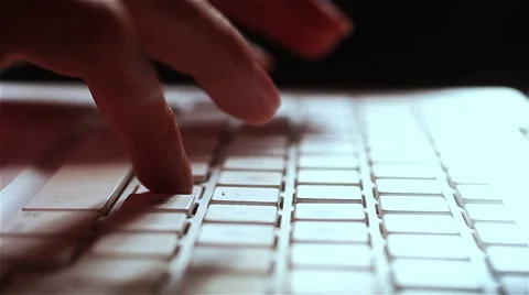 Hands of young attractive woman Typing on keyboard of a White Computer Laptop Stock Footage