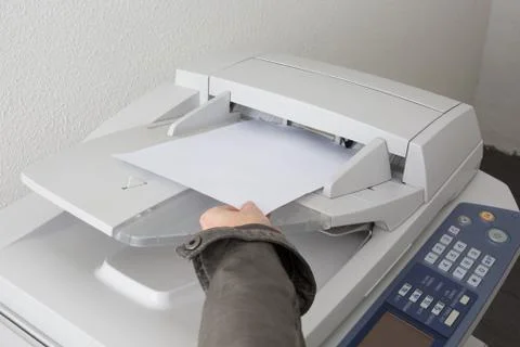 The hands of a young businesswoman is placing a document Stock Photos