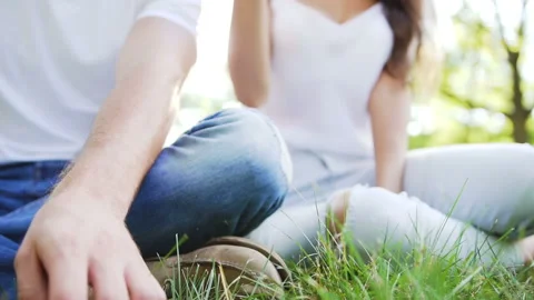 Hands of young couple while turning a hand spinner. Stock Footage 87911273