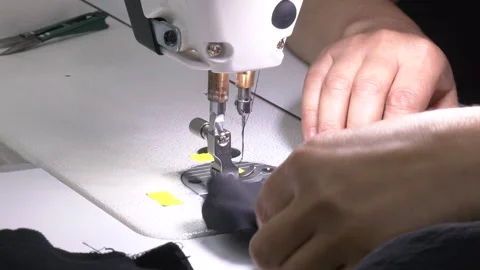 Hands of young girl on sewing machine Stock Footage 321829223