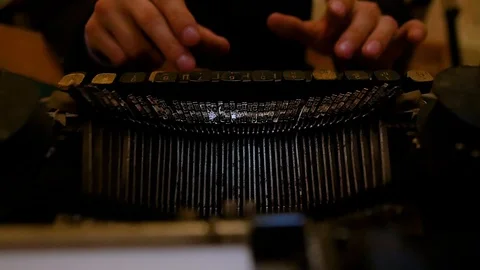 Hands of a young man close-up print on an old typewriter. Stock Footage 93663880