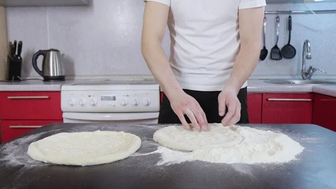 Hands of young man prepare dough 動画素材 127689781
