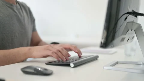 Hands of Young Man Typing on Keyboard, Close Up Stock Footage 146479643