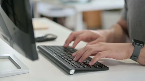 Hands of Young Man Typing on Keyboard, Close Up Video stock 146483506