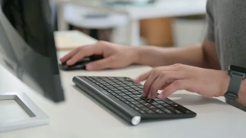 Hands of Young Man Using Mouse and Keyboard, Close Up Stock Footage 146484280
