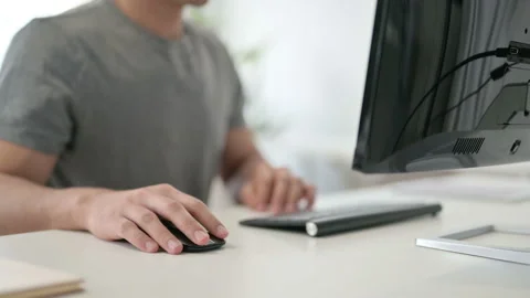 Hands of Young Man Using Mouse and Keyboard, Close Up Video stock 146485174