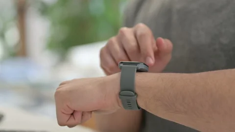Hands of Young Man Using Smartwatch, Close Up Stock Footage 146484483
