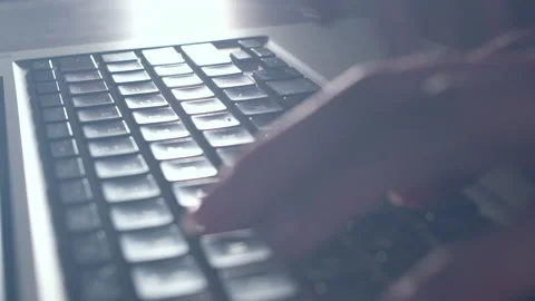 Hands of a young woman on computer keyboard. The camera is in motion - on dolly Stock-Footage 87344589