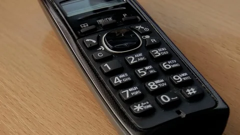 Handset spins on the table Stock Footage 78910513