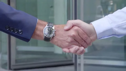 Handshake beetween two men Windows Brackground Stock Footage