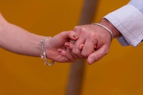 Handshake between two people who love each other as a symbol of love and frie Stock Footage 101632688