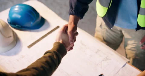 Handshake, blueprint and construction workers on site with partnership, Stock Footage 337016127
