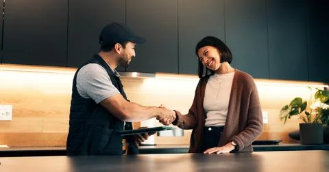 Handshake, client and tablet with handyman in kitchen for invoice agreement Stock Photos