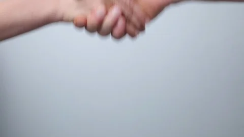 Handshake. Close-up of partners shaking hands. Stock Footage 119232756