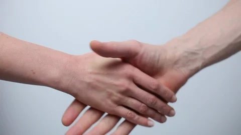Handshake. Close-up of partners shaking hands. Video stock 119233429