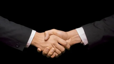 Handshake on a green background Stock Footage 72213490