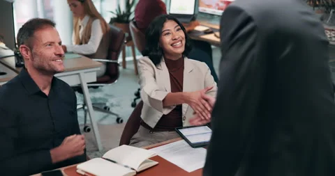 Handshake, interview and greeting with people in office, onboarding and HR with Stock Footage 341457621