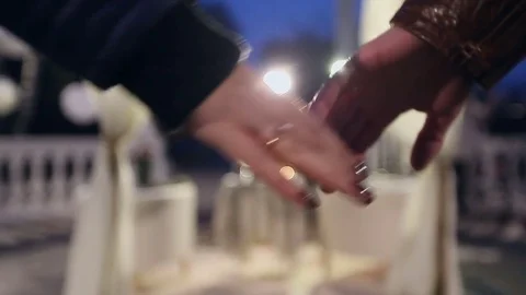 Handshake of lovers in the background of the scenery for a romantic encounter Stock Footage 82283920