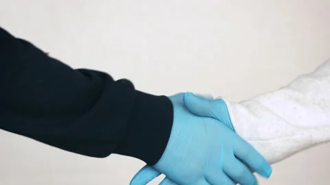 Handshake in Medical Gloves Stock Footage 144642002