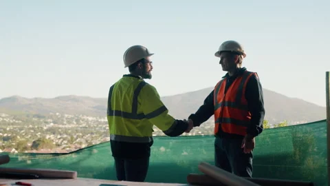 Handshake, meeting and men on construction site for planning, property Stock Footage 336210249