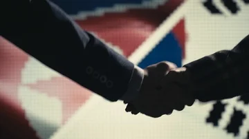 Handshake. Multiple takes. North Korea and South Korea flag on LED background. Stock Footage 85690688