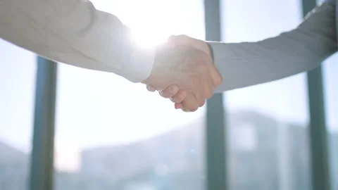 Handshake, partnership and trust in support, teamwork or deal together against a Stock Footage 217962552