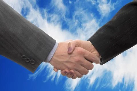 Handshake sky Stock Photos