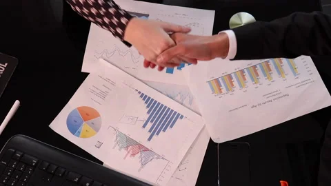 A Handshake Of Two Businessmen In The Suits Stock Footage 153674744