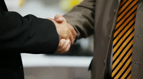 Handshake of two men Stock Footage