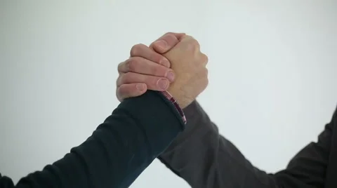 Handshake of two men at white background Stock Footage 48221933