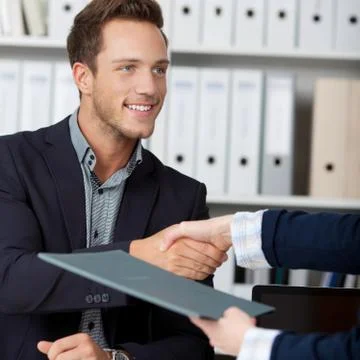 Handshake while job interviewing Foto stock
