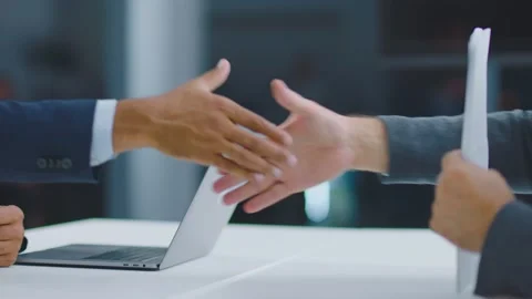 Handshaking above table in office Stock Footage 168277045
