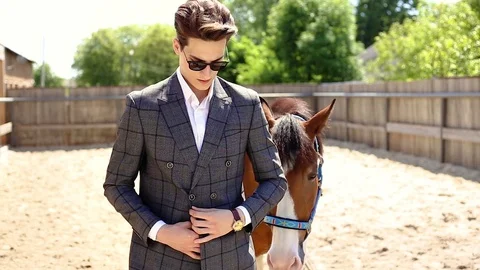 Handsme men standing in a ranch Stock Footage 111143182