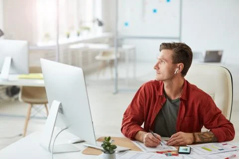 Handsome Adult Man Working in Modern Office Stock Photos