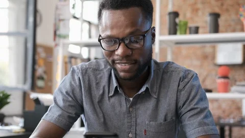 Handsome african american man using messaging application Stock Footage 113967074